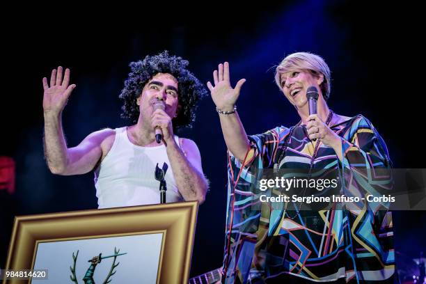 Elio and Paola Folli of Elio e le Storie Tese perform on stage at CarroPonte on June 26, 2018 in Milan, Italy.