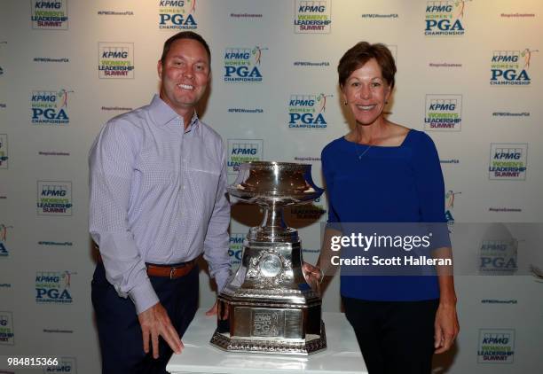 Commissioner Michael Whan and Suzy Whaley of the PGA of America pose together at the KPMG Women's PGA Championship Welcome Reception at the Chicago...