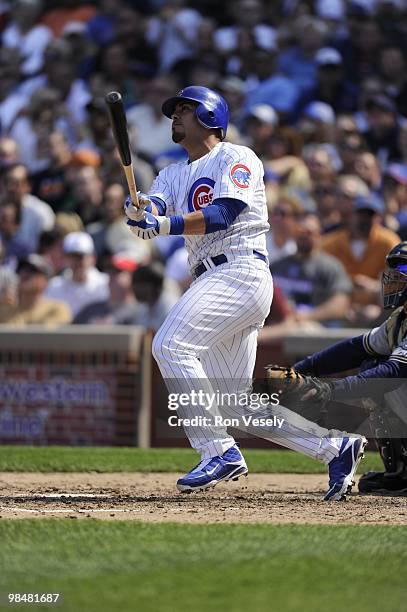 Geovany Soto of the Chicago Cubs hits a home run against the Milwaukee Brewers on April 14, 2010 at Wrigley Field in Chicago, Illinois. The Cubs...