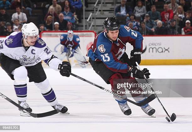 Chris Stewart of the Colorado Avalanche skates against Dustin Brown of the Los Angeles Kings at the Pepsi Center on April 11, 2010 in Denver,...