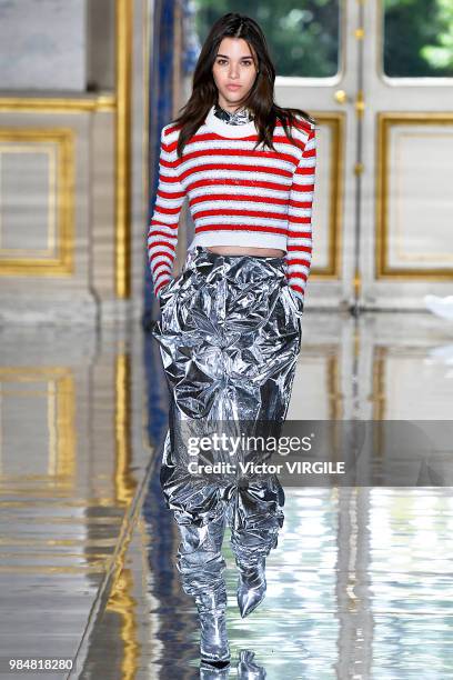 Pauline Hoarau walks the runway during the Balmain Menswear Spring/Summer 2019 fashion show as part of Paris Fashion Week on June 24, 2018 in Paris,...