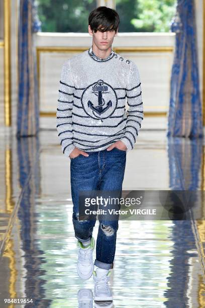 Model walks the runway during the Balmain Menswear Spring/Summer 2019 fashion show as part of Paris Fashion Week on June 24, 2018 in Paris, France.