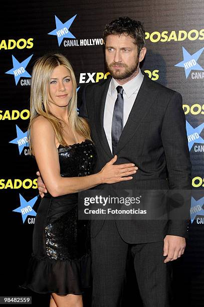 Actress Jennifer Aniston and actor Gerard Butler attend the premiere of "The Bounty Hunter" at Callao Cinema on March 30, 2010 in Madrid, Spain.