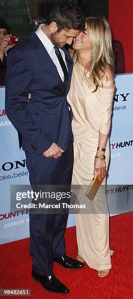 Gerard Butler and Jennifer Aniston attend the premiere of 'The Bounty Hunter' at the Ziegfeld Theater on March 16, 2010 in New York, New York.