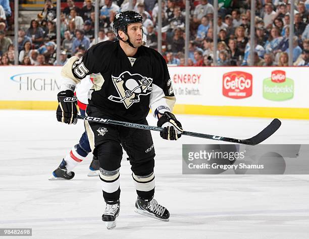 Maxime Talbot of the Pittsburgh Penguins skates up ice against the Washington Capitals on April 6, 2010 at the Mellon Arena in Pittsburgh,...