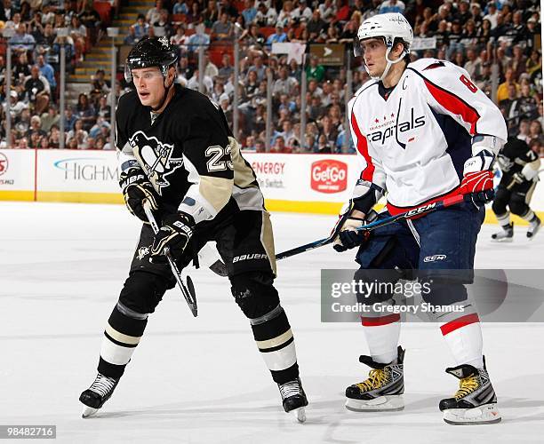 Alexei Ponikarovsky of the Pittsburgh Penguins battles for position against Alex Ovechkin of the Washington Capitals on April 6, 2010 at the Mellon...