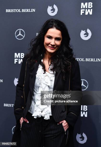 Actress Mariella Ahrens arrives for the fashion show of the label "Riani" at the ewerk during Fashion Week in Berlin, Germany, 16 January 2018....