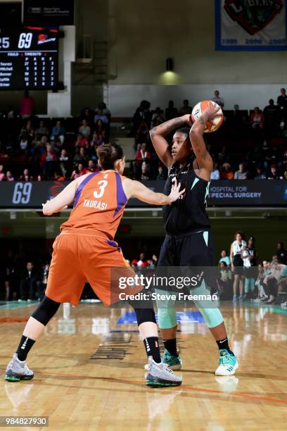 Kia Vaughn of the New York Liberty handles the ball against the Phoenix Mercury on June 26, 2018 at Westchester County Center in White Plains, New...