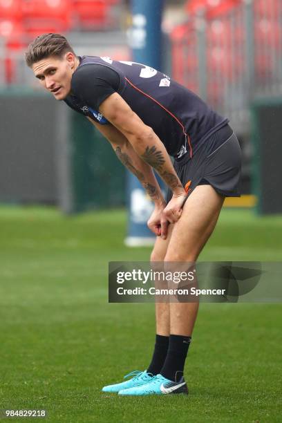 Rory Lobb of the Giants looks on during a Greater Western Sydney Giants AFL training session at Spotless Stadium on June 27, 2018 in Sydney,...