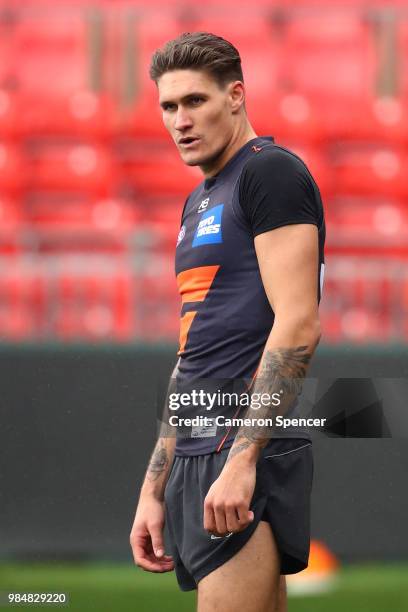 Rory Lobb of the Giants looks on during a Greater Western Sydney Giants AFL training session at Spotless Stadium on June 27, 2018 in Sydney,...