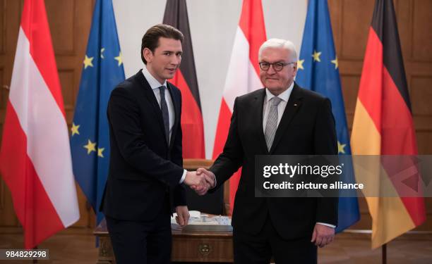 Dpatop - German President Frank-Walter Steinmeier shakes hands with Austrian Chancellor Sebastian Kurz at the Bellevue Palace in Berlin, Germany, 18...