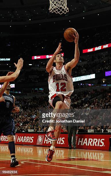 Kirk Hinrich of the Chicago Bulls drives to the basket against the Utah Jazz at the United Center on March 9, 2010 in Chicago, Illinois. The Jazz...