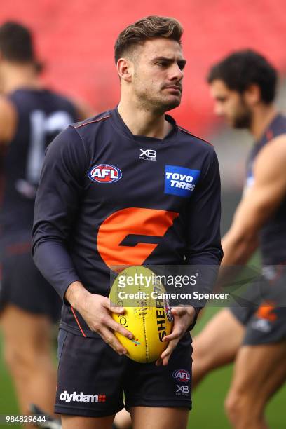 Stephen Coniglio of the Giants looks on during a Greater Western Sydney Giants AFL training session at Spotless Stadium on June 27, 2018 in Sydney,...