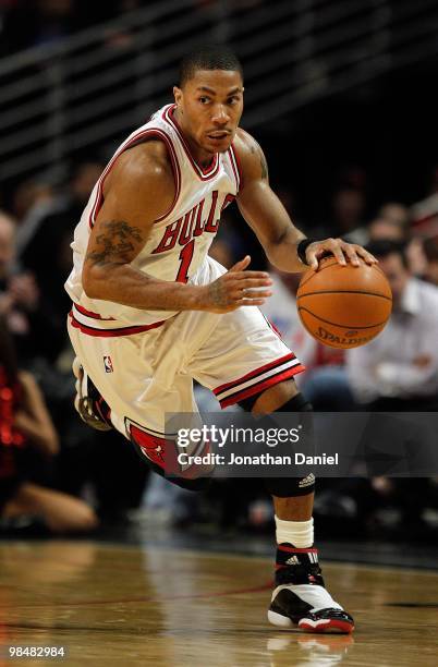 Derrick Rose of the Chicago Bulls brings the ball up court against the Houston Rockets at the United Center on March 22, 2010 in Chicago, Illinois....