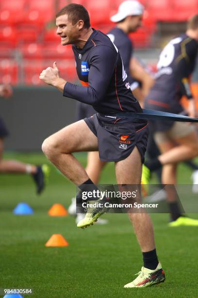 Heath Shaw of the Giants warms up during a Greater Western Sydney Giants AFL training session at Spotless Stadium on June 27, 2018 in Sydney,...