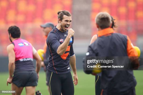 Phil Davis of the Giants shows his emotion during a Greater Western Sydney Giants AFL training session at Spotless Stadium on June 27, 2018 in...