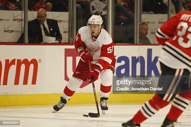 Valtteri Filppula of the Detroit Red Wings passes the puck into the Chicago Blackhawks zone at the United Center on April 11, 2010 in Chicago,...
