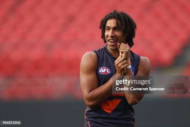 Aiden Bonar of the Giants looks on during a Greater Western Sydney Giants AFL training session at Spotless Stadium on June 27, 2018 in Sydney,...