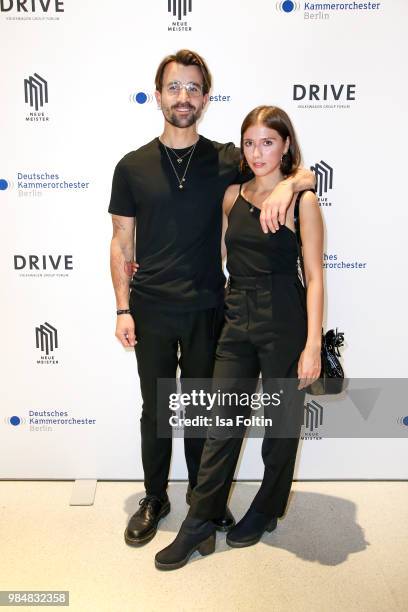 Blogger David Roth and his girlfriend Pia Fatah during the 8th edition of the Berlin concert series 'Neue Meister' at Volkswagen Group Forum DRIVE on...