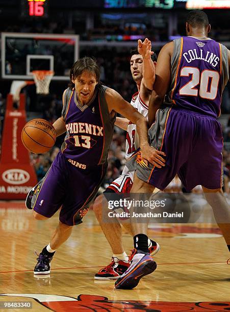 Steve Nash of the Phoenix Suns drives around a screen set by teammate Jarron Collins on Kirk Hinrich of the Chicago Bulls at the United Center on...