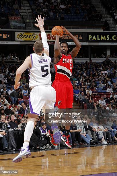 Martell Webster of the Portland Trail Blazers shoots a jump shot against Andres Nocioni of the Sacramento Kings during the game at Arco Arena on...