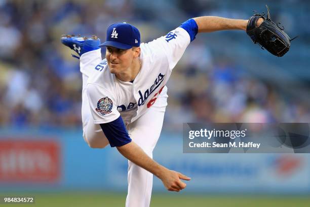 Ross Stripling of the Los Angeles Dodgers pitches during the first inning of a game against the Chicago Cubs at Dodger Stadium on June 26, 2018 in...