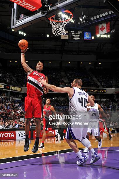 Dante Cunningham of the Portland Trail Blazers rebounds against Jon Brockman of the Sacramento Kings during the game at Arco Arena on April 3, 2010...