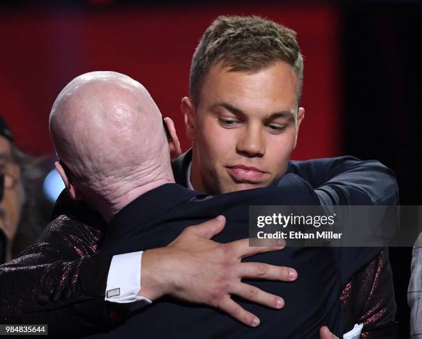 Taylor Hall of the New Jersey Devils reacts in the audience after being named the winner of the Hart Trophy, given to the most valuable player to his...