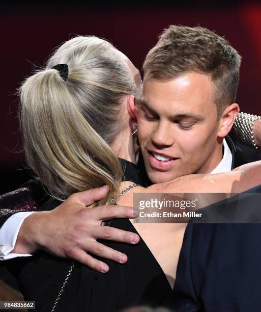 Taylor Hall of the New Jersey Devils reacts in the audience after being named the winner of the Hart Trophy, given to the most valuable player to his...
