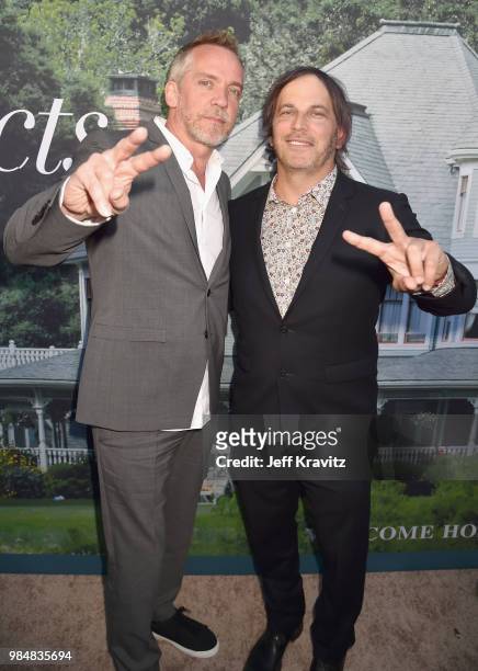 Jean-Marc Vallee and Nathan Ross attend HBO's Sharp Objects Los Angeles premiere at ArcLight Cinerama Dome on June 26, 2018 in Hollywood, California.