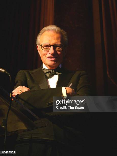 Larry King poses with arms crossed while serving as the emcee for the Anti-Defamation League dinner, New York, 2005. The dinner was held at Cipriani.