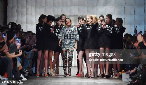 The Austrian fashion designer Marina Hoermanseder runs on the catwalk after the presentation of her label's Autumn/Winter Collection 2018/19 during...