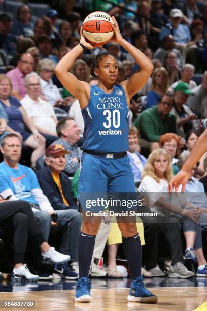 Guard Tanisha Wright of the Minnesota Lynx looks to pass the ball during the game against the Seattle Storm on June 26, 2018 at Target Center in...