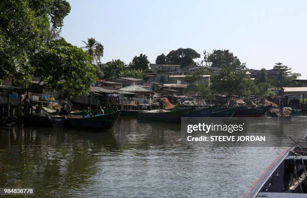 General view shows a fishermen's village outside Libreville on June 21, 2018. - Foreign fishermen from - Nigerians and Beninese most of whom arrived...