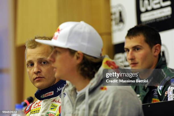 Mikko Hirvonen of Finland, Kimi Raikkonen of Finland and Matthew Wilson of Great Britain attend the FIA Pre Event Press Conference after the...