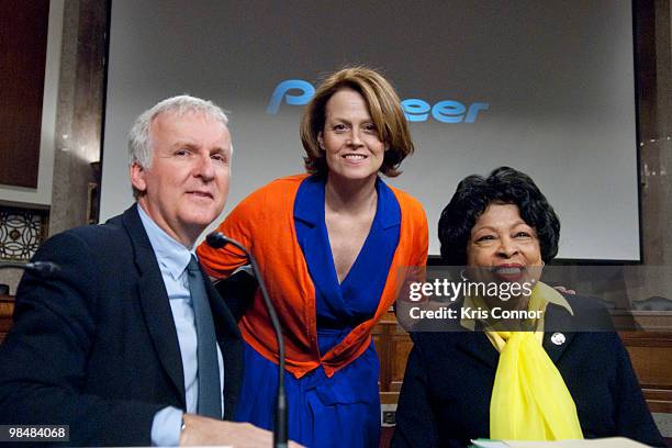 James Cameron, Sigourney Weaver and Diane Watson pose for photographers before a panel discussion on global environmental issues and sustainable...