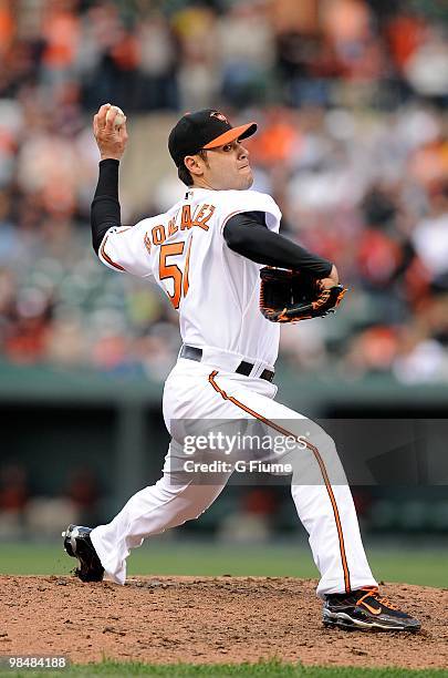 Michael Gonzalez of the Baltimore Orioles pitches against the Toronto Blue Jays on Opening Day at Camden Yards on April 9, 2010 in Baltimore,...