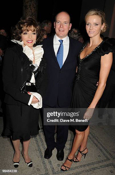 Joan Collins, Prince Albert II of Monaco and Charlene Wittstock attend the private view of exhibition 'Grace Kelly: Style Icon', at the Victoria &...