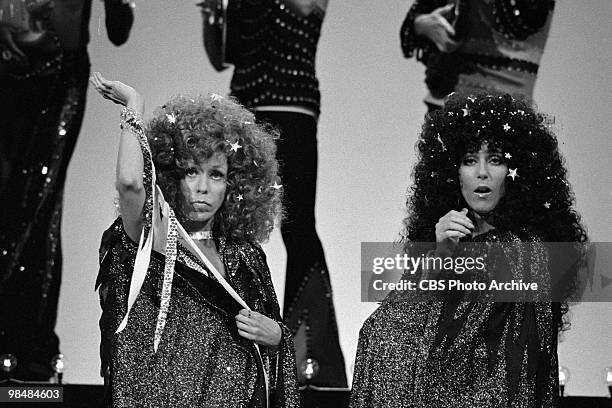 Actors Carol Burnett and guest star Cher on "The Carol Bunett Show" on August 15, 1975 in Los Angeles, California.