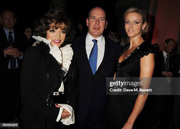 Joan Collins, Prince Albert II of Monaco and Charlene Wittstock attend the private view of exhibition 'Grace Kelly: Style Icon', at the Victoria &...