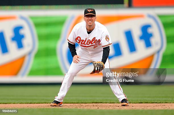 Garrett Atkins of the Baltimore Orioles plays first base against the Toronto Blue Jays on Opening Day at Camden Yards on April 9, 2010 in Baltimore,...