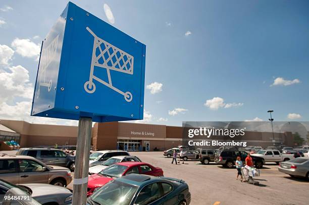 The Wal-Mart Store No. 1 stands in Rogers, Arkansas, U.S., on Thursday, April 15, 2010. Wal-Mart Stores Inc., the world's largest retailer, reclaimed...