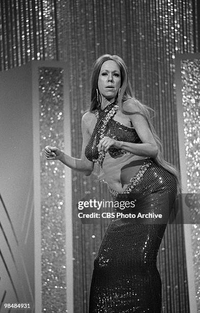 March 14: Actress Carol Burnett in a spoof on Cher on "The Carol Bunett Show" on March 14, 1975 in Los Angeles, California.