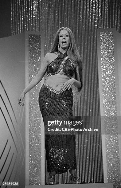 March 14: Actress Carol Burnett in a spoof on Cher on "The Carol Bunett Show" on March 14, 1975 in Los Angeles, California.