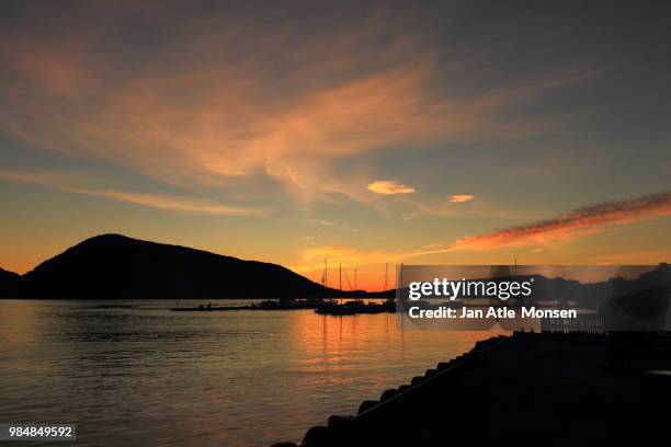 sunset in rosendal. norway - atle stock pictures, royalty-free photos & images