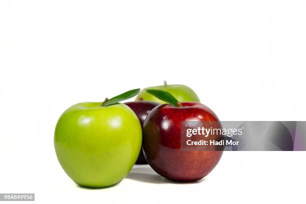 apples in red and green. - hadi stock pictures, royalty-free photos & images