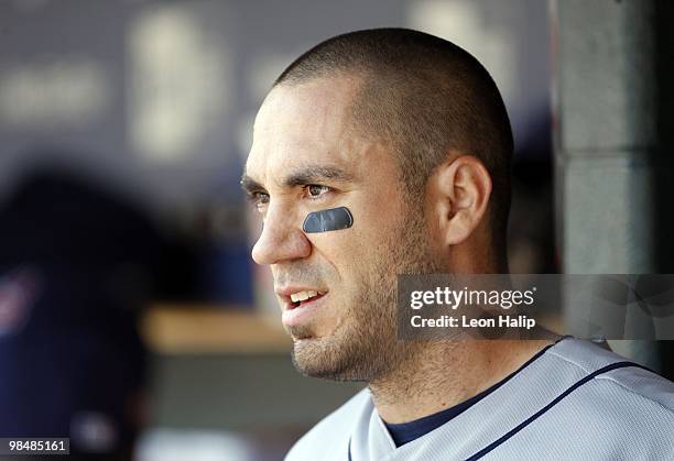 Travis Hafner of the Cleveland Indians watches the action on the field during the game against the Detroit Tigers. The Tigers won the game 9-8 over...