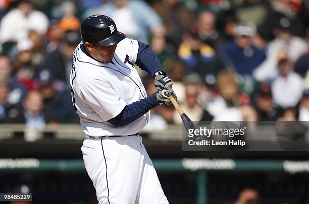Magglio Ordonez of the Detroit Tigers swings at a pitch during the game against the Kansas City Royals on April 13, 2010 at Comerica Park in Detroit,...