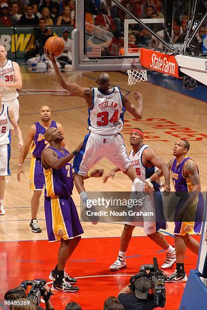 Travis Outlaw of the Los Angeles Clippers goes up for a dunk against the Los Angeles Lakers at Staples Center on April 14, 2010 in Los Angeles,...