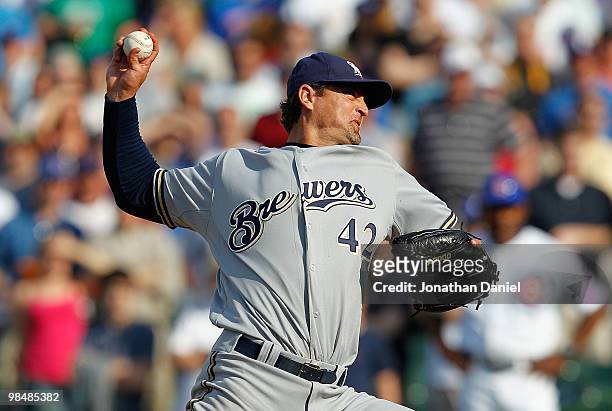 Trevor Hoffman of the Milwaukee Brewers, wearing a number 42 jersey in honor of Jackie Robinson, delivers the ball as he finishes off the Chicago...